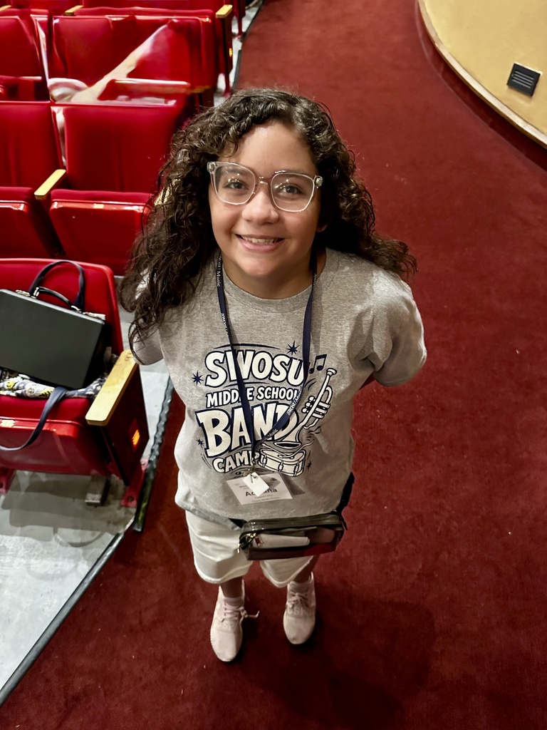 CMS Band student smiling at the concert
