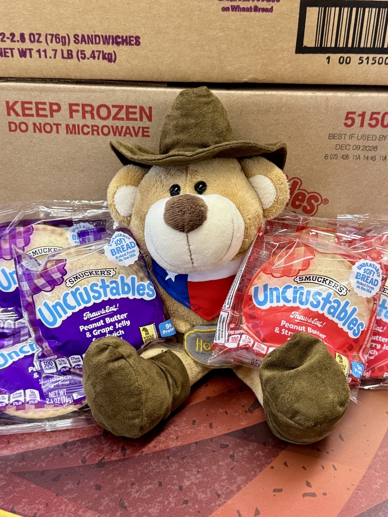 Stuffed bear holding Uncrustables