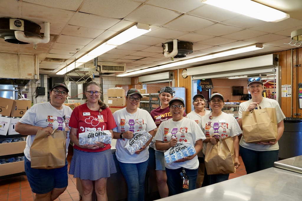 Kitchen staff ready to hand out lunches