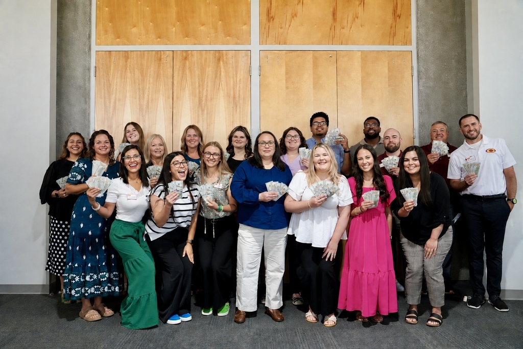 New teachers holding $500 cash