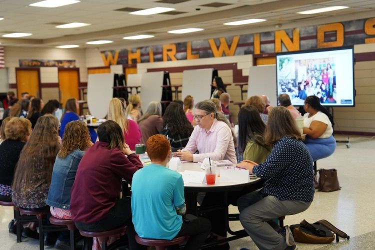Secondary teachers sitting at tables