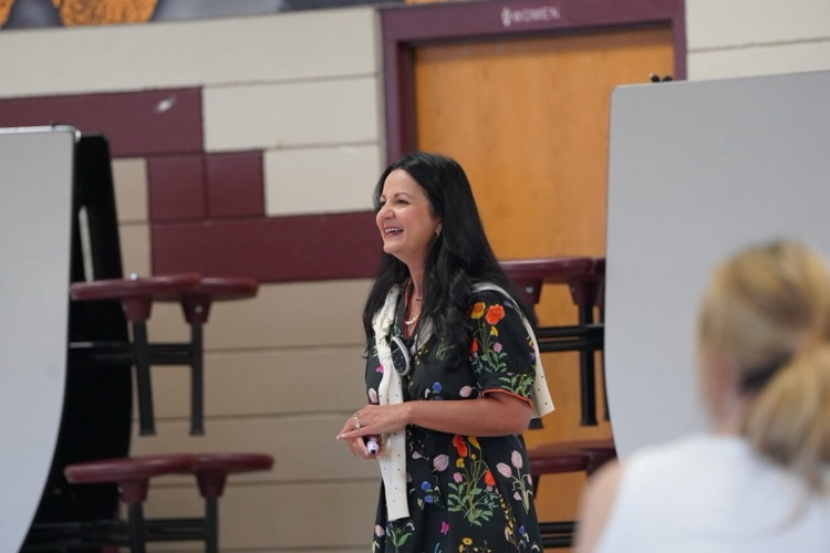 Inservice guest speaker addressing teachers