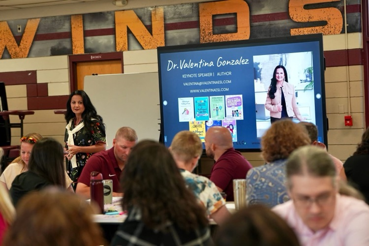 guest speaker sharing instructions with teachers