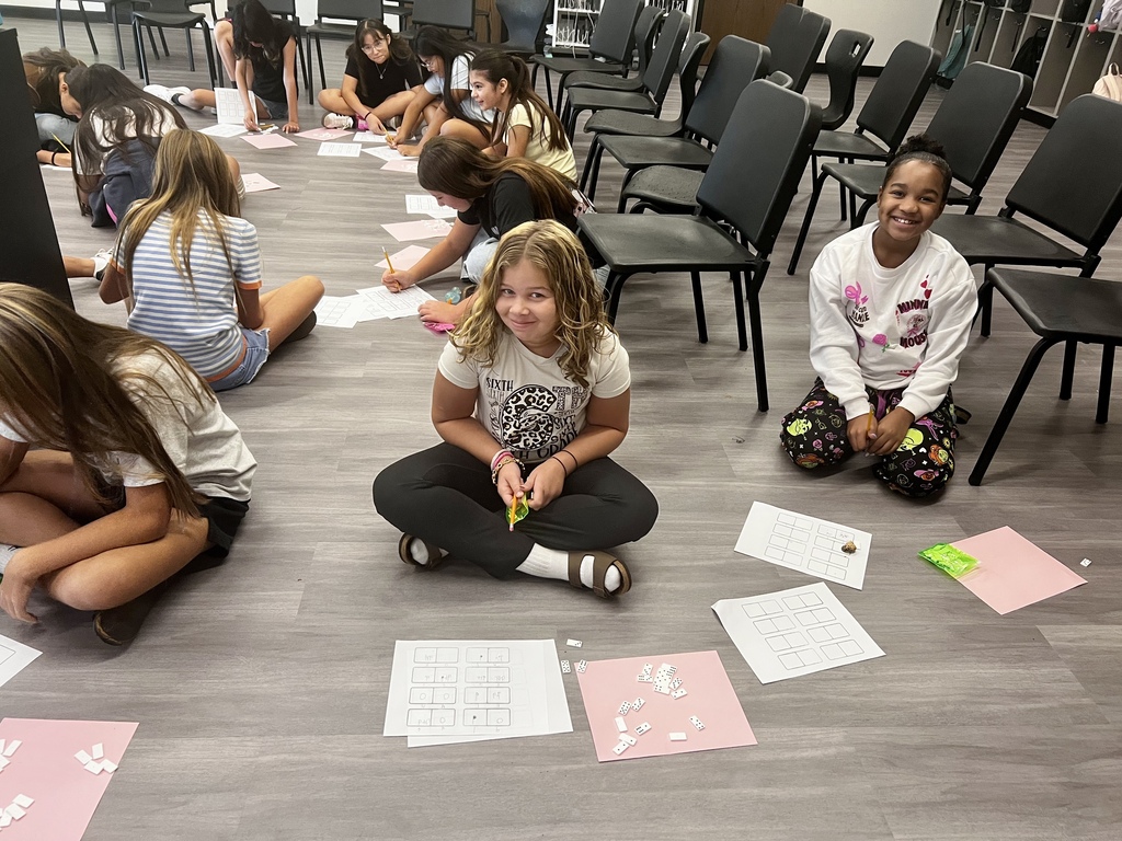 2 students working with domino rhythms in music