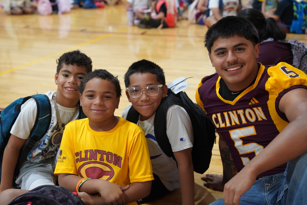 Southwest students and a Red Tornado Football player at Rise and Shine