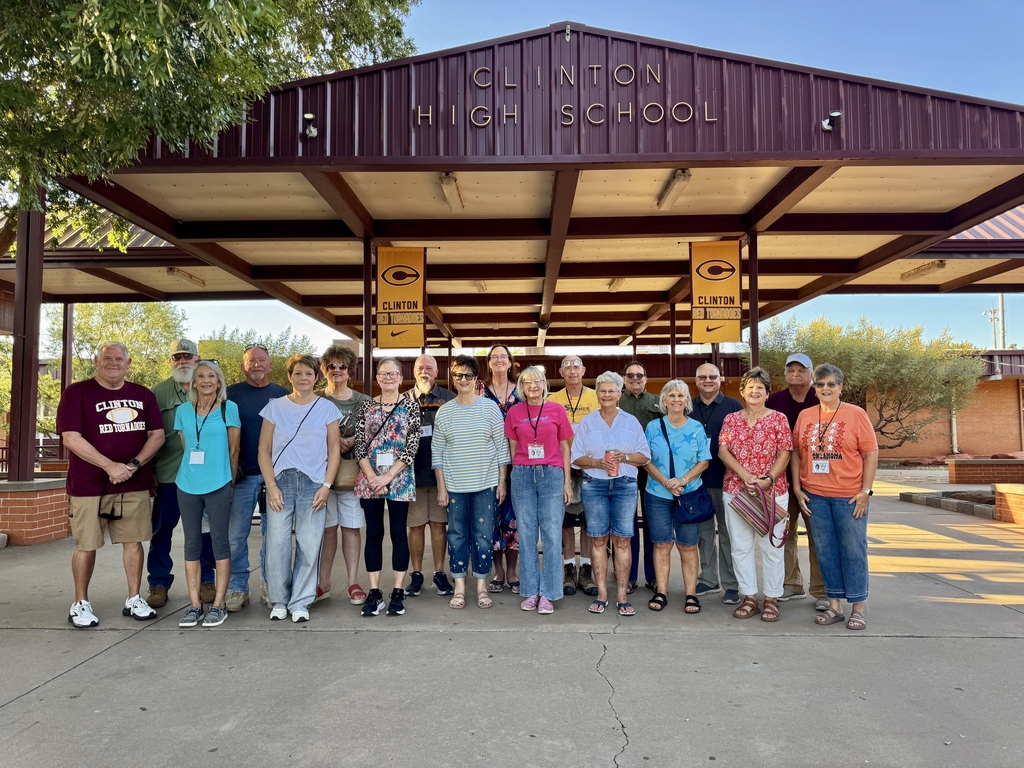 Class of 1976 standing in front of CHS