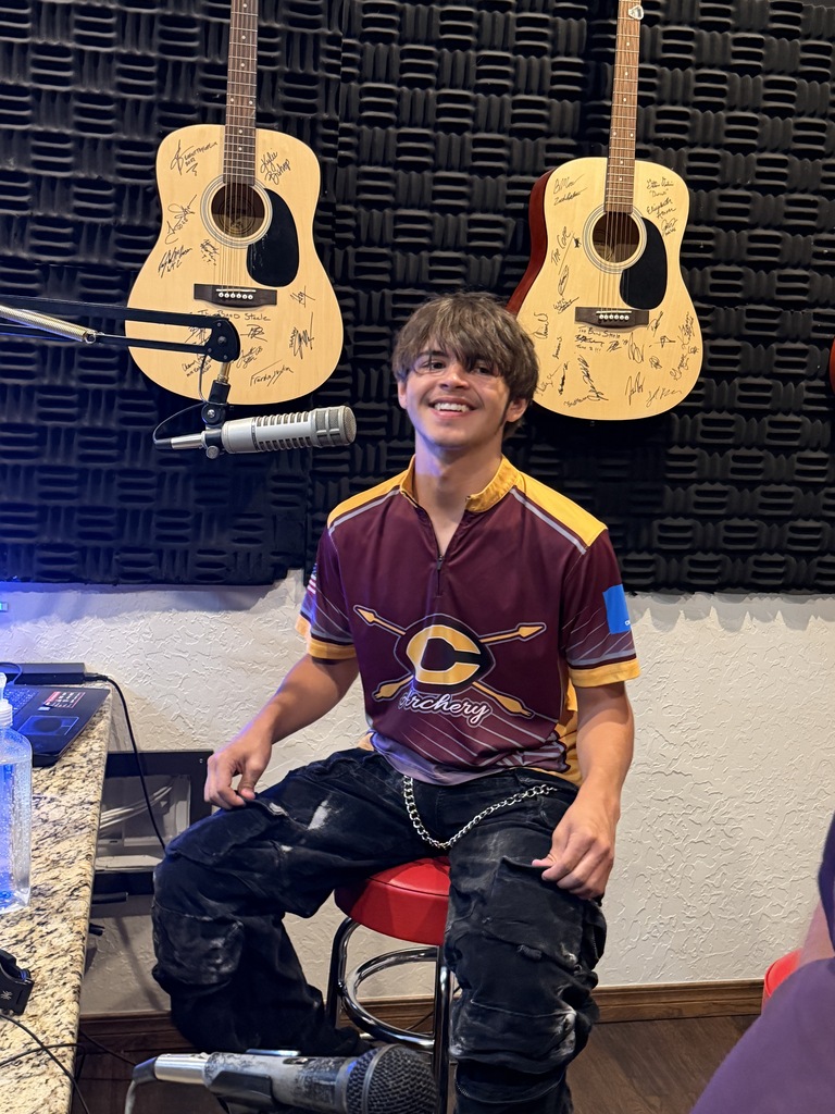 Archery National Qualifier smiling at the radio station