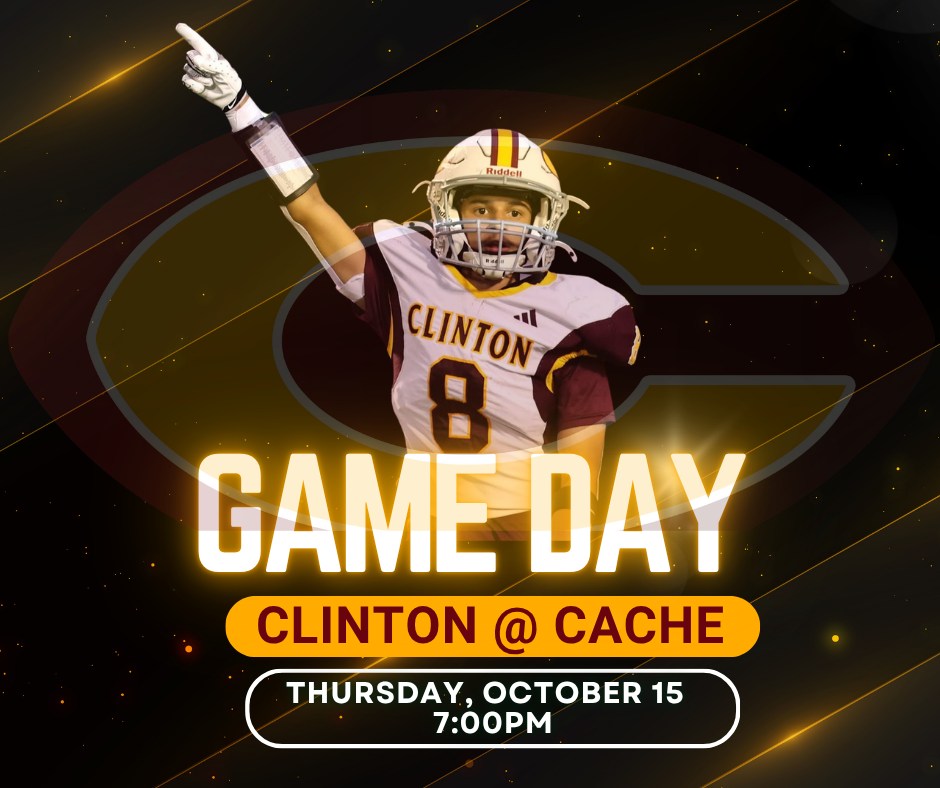 Football player holding up arm with Game Day at Cache