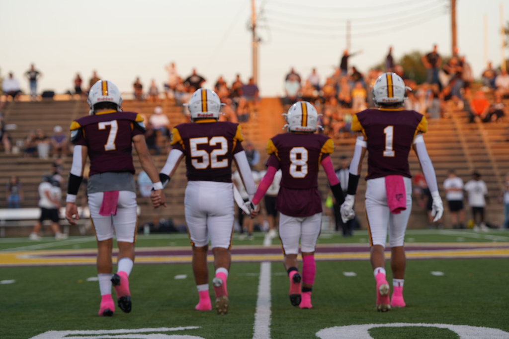 Football captains walking onto the field