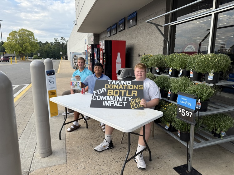 students taking donations at wal mart