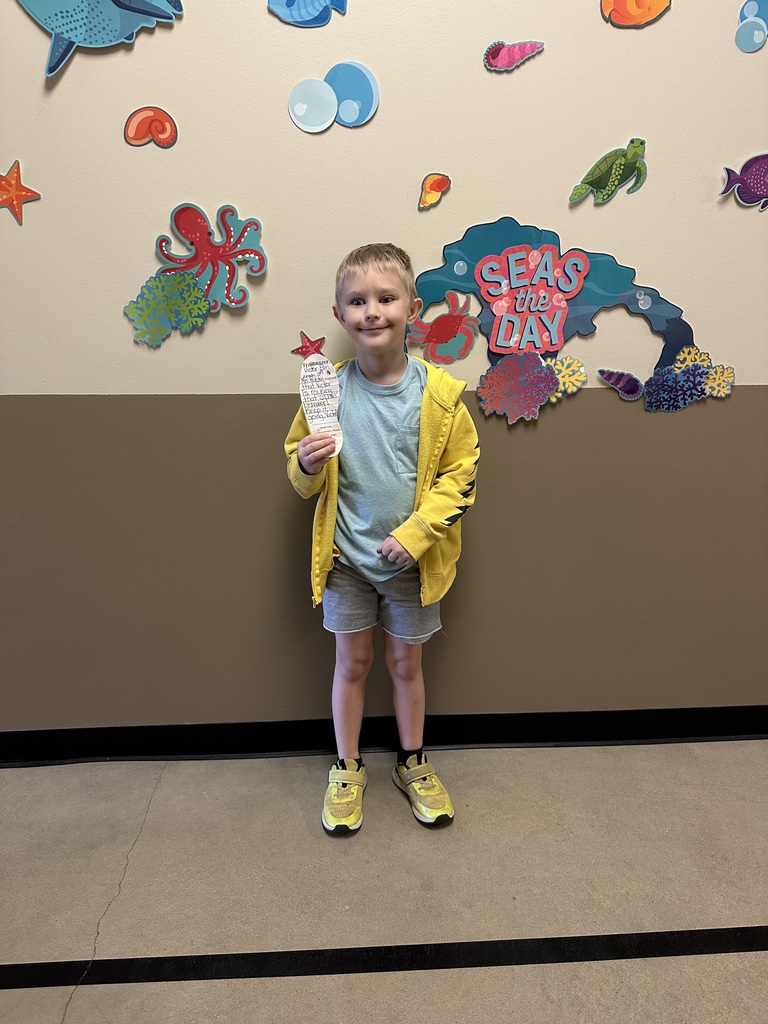 student in a yellow jacket