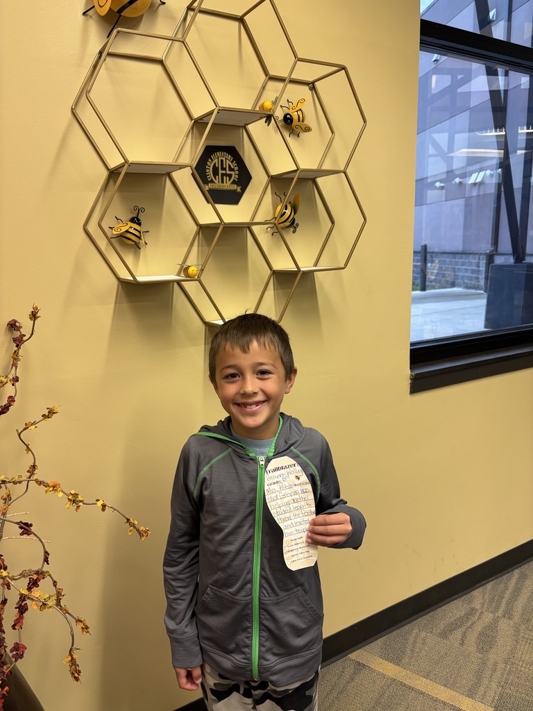 Little boy holding a foot cut out