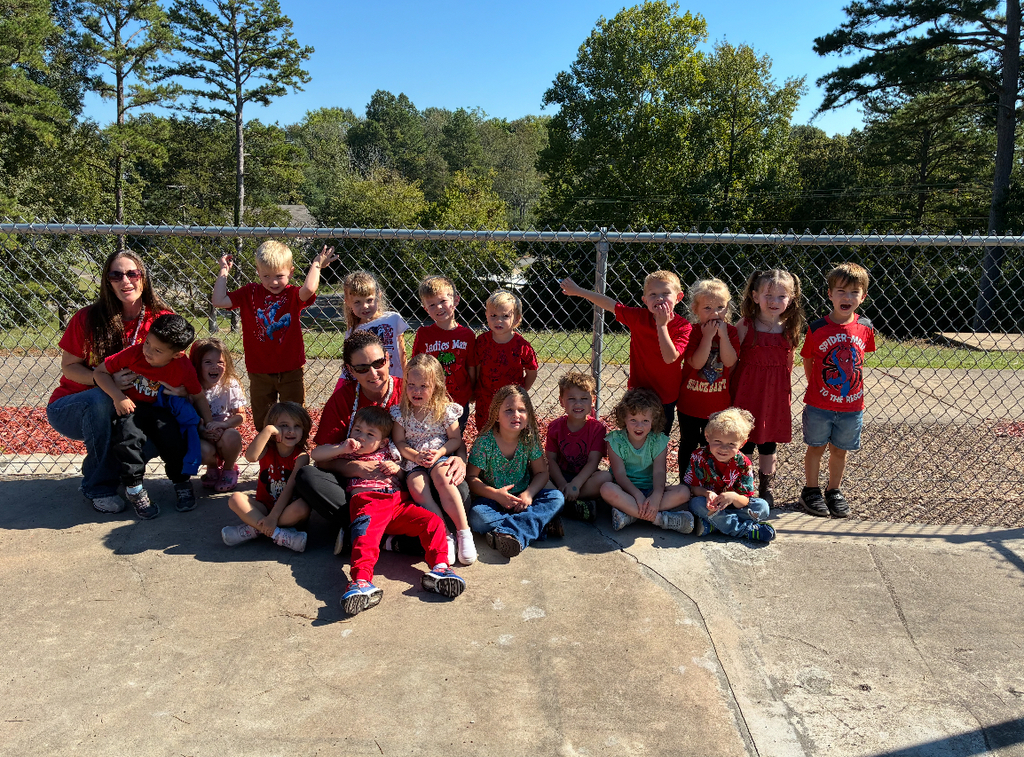 group of students wearing red