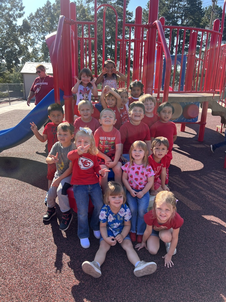 group of students wearing red