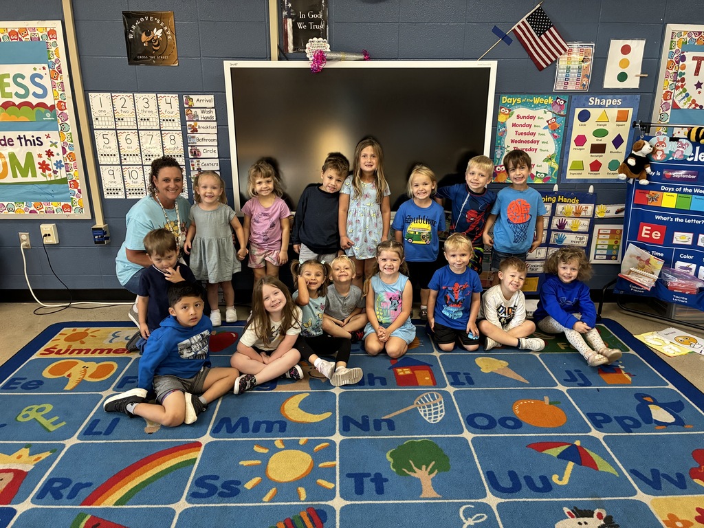 a group of kids wearing blue