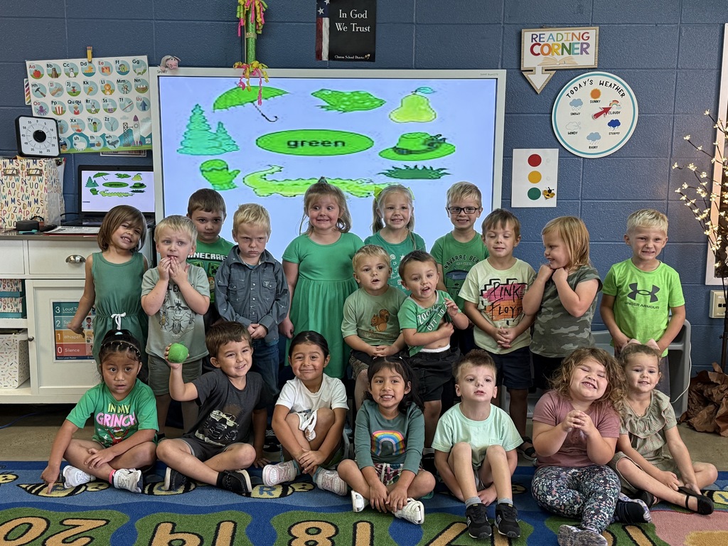 group of students wearing green