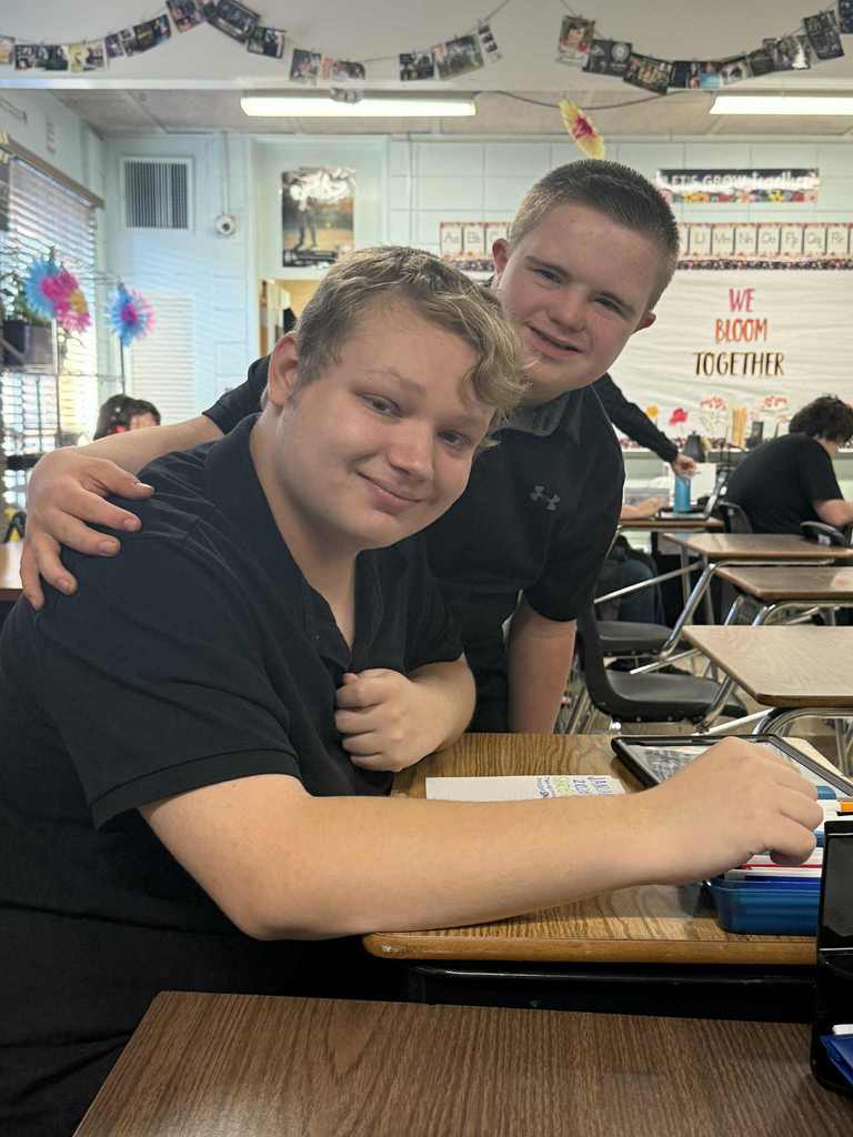 2 boys hugging