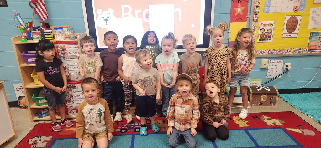 group of students wearing brown