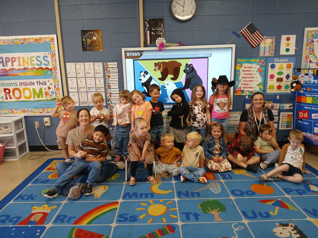 group of students wearing brown