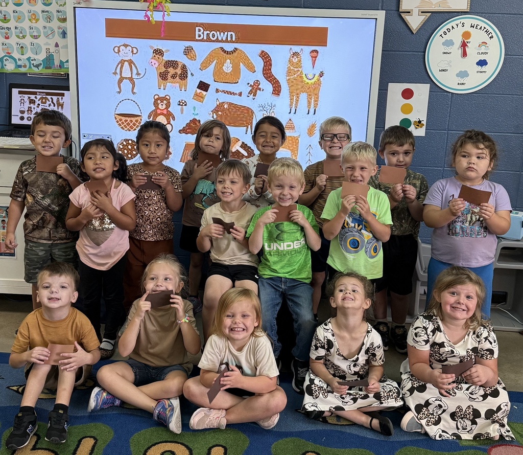 group of students wearing brown