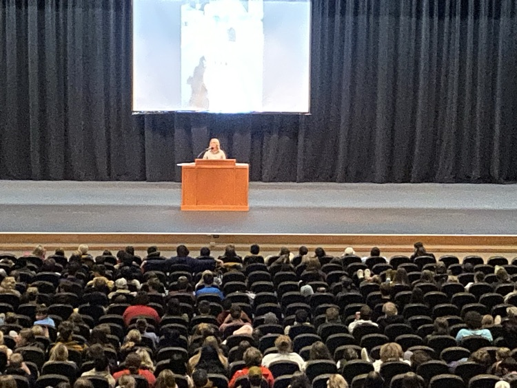 group of people in an auditorium