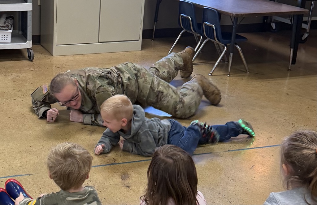 soldiers speaking to prek students