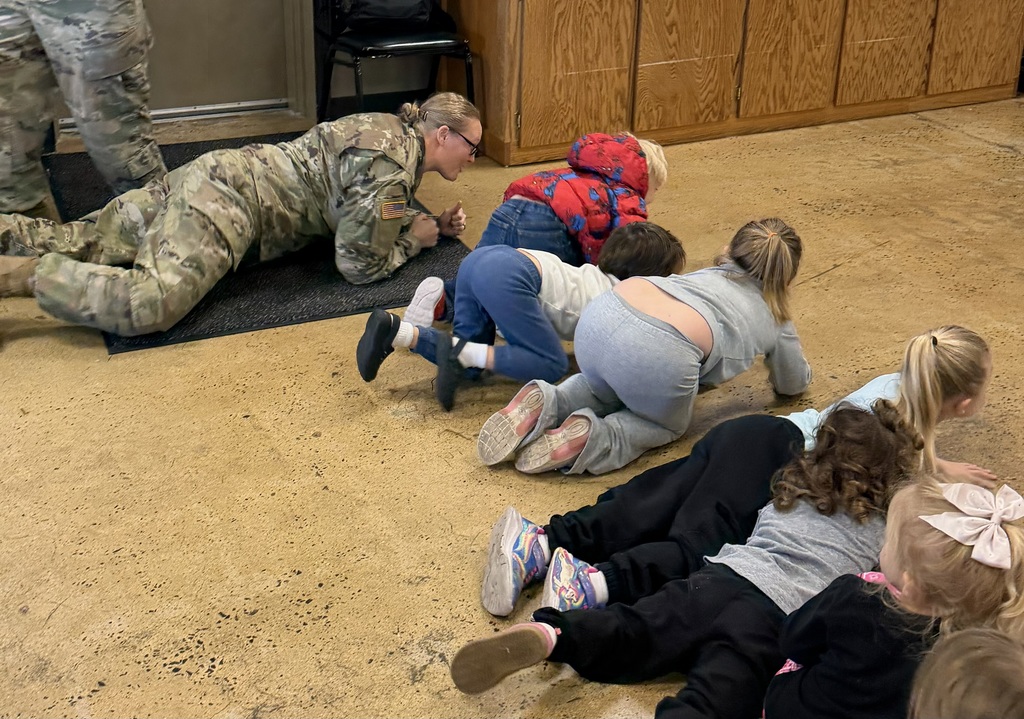 soldiers speaking to prek students