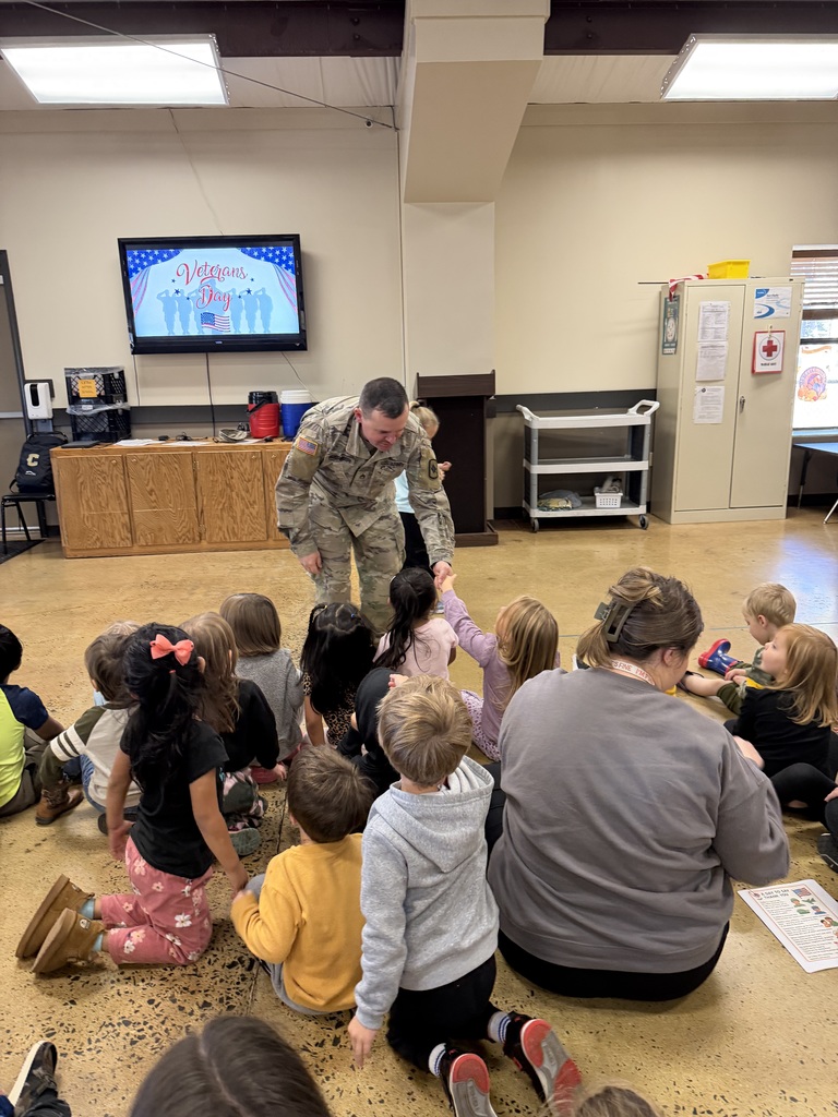 soldiers speaking to prek students