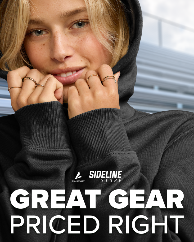 girl wearing a hoodie advertising a store