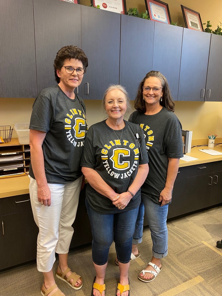 people in a group wearing matching shirts