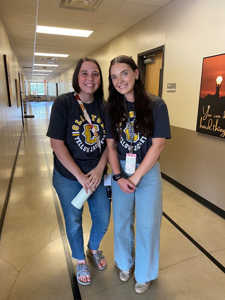 people in a group wearing matching shirts