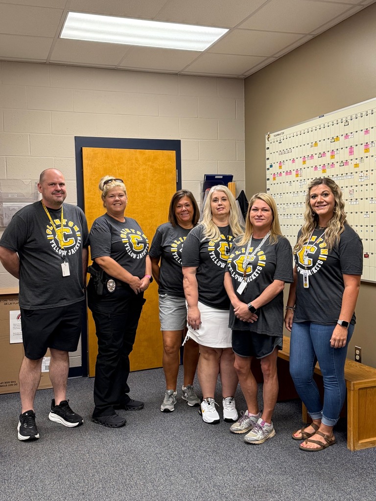 people in a group wearing matching shirts