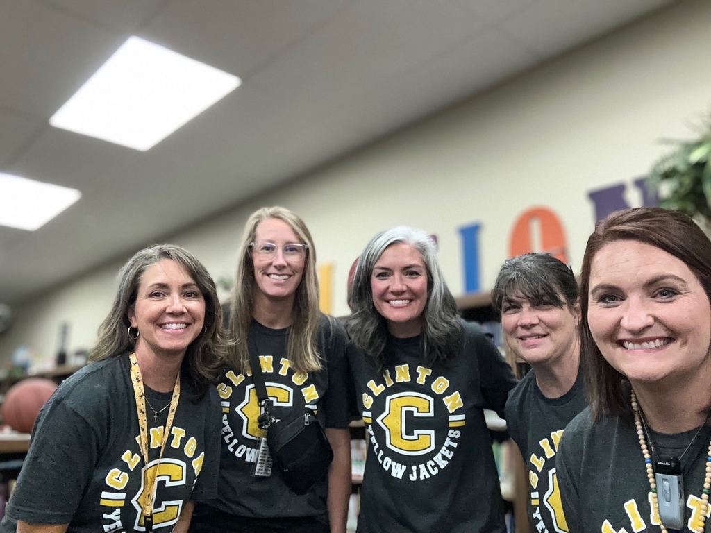 people in a group wearing matching shirts