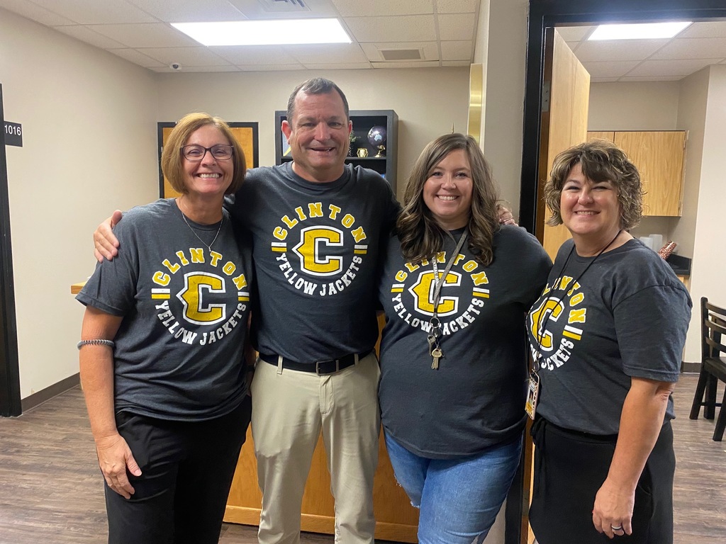 people in a group wearing matching shirts