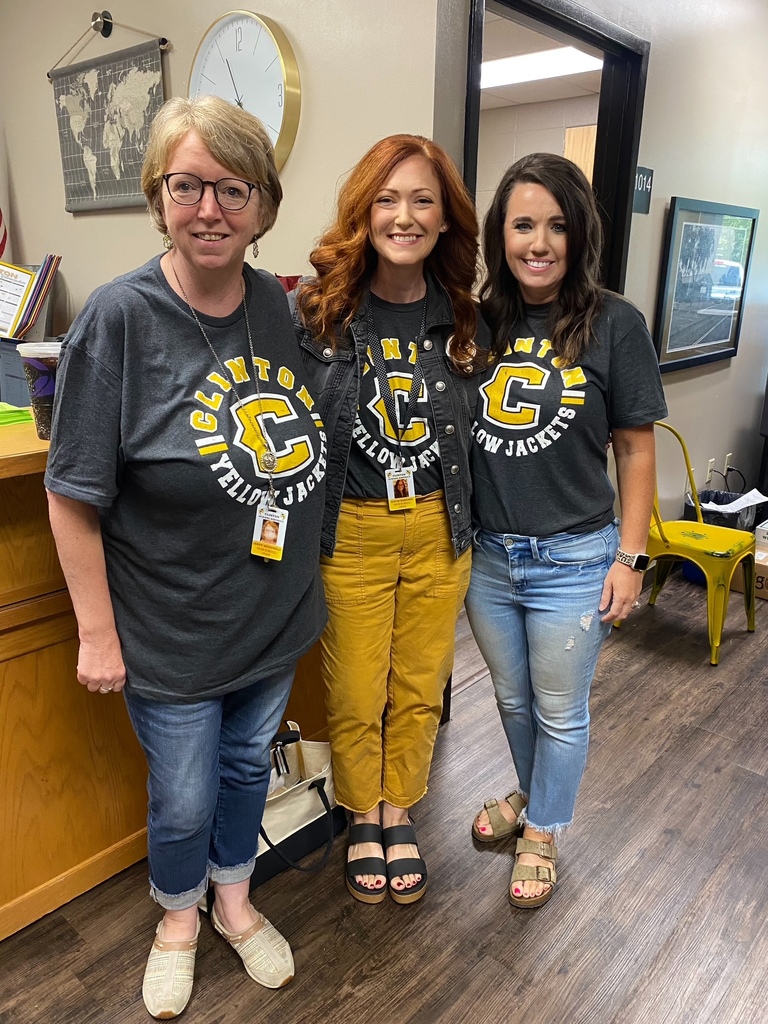 people in a group wearing matching shirts