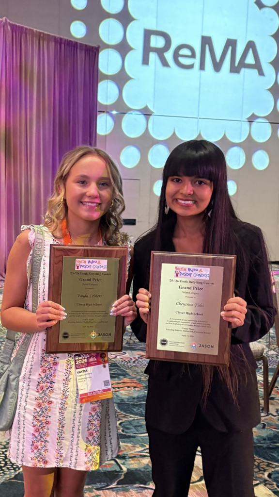 Students with plaques