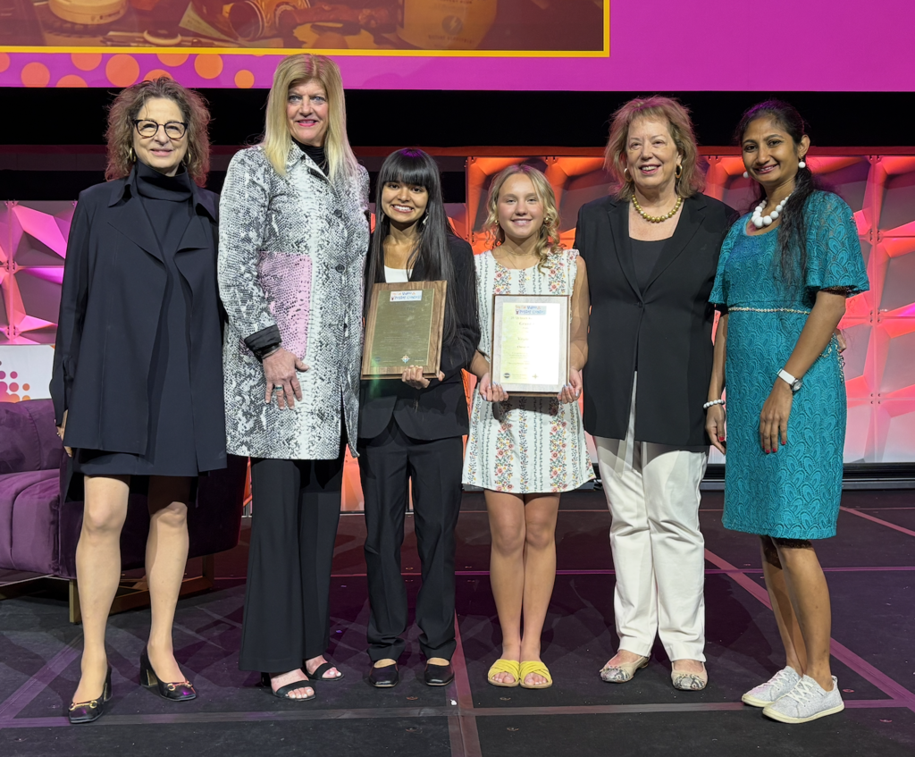 Students with plaques