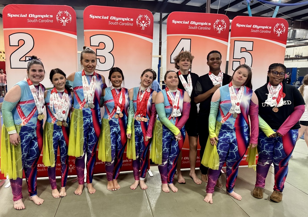 Team members with medals