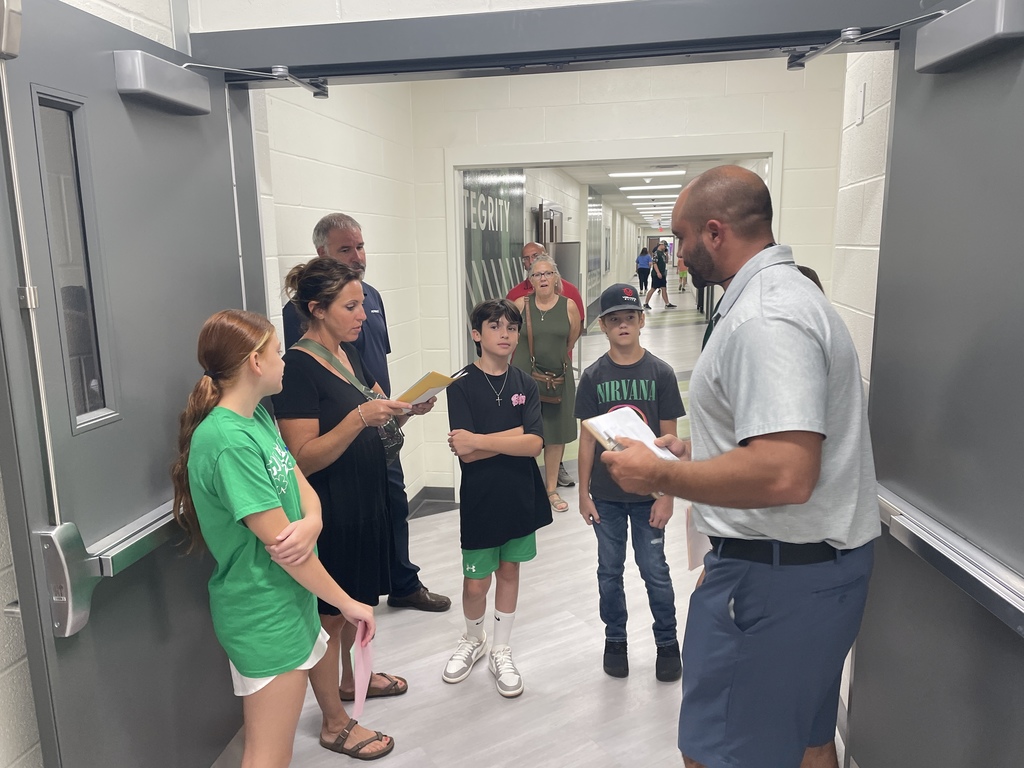Family in the athletic hallway
