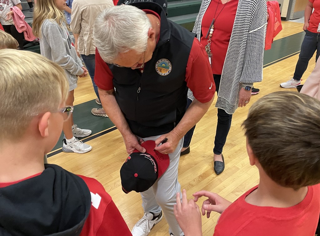 Jim Tressel signing autographs