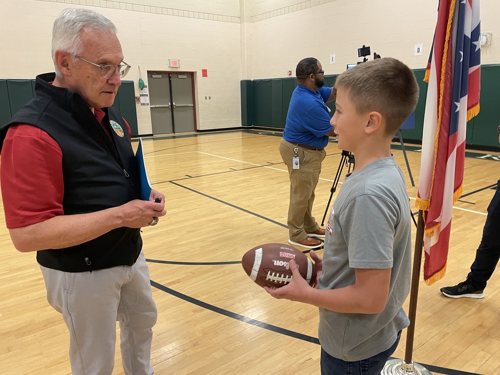 Tressel with student