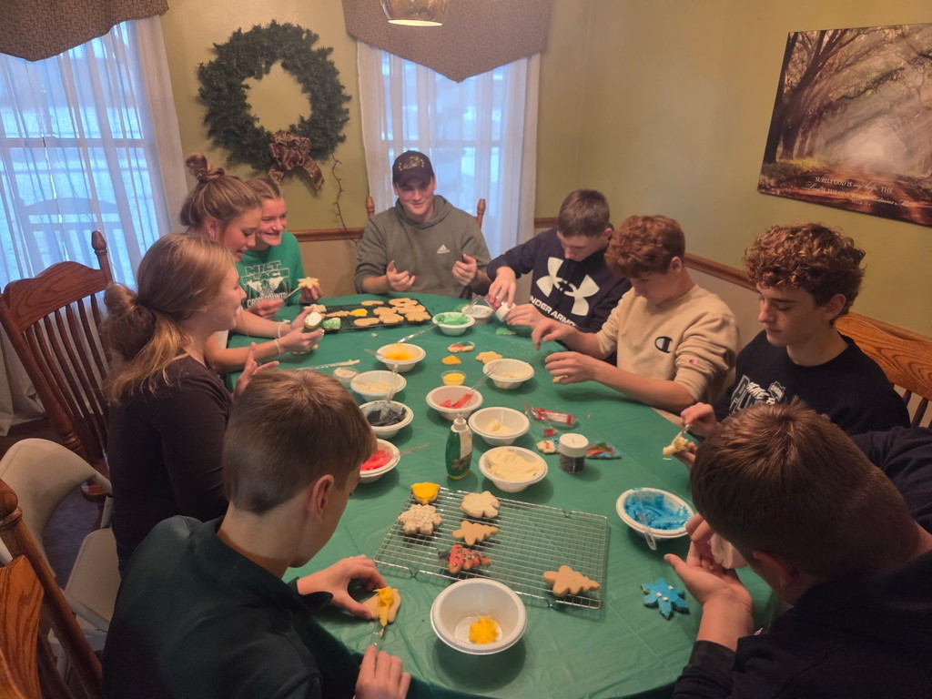 Students decorating cookies