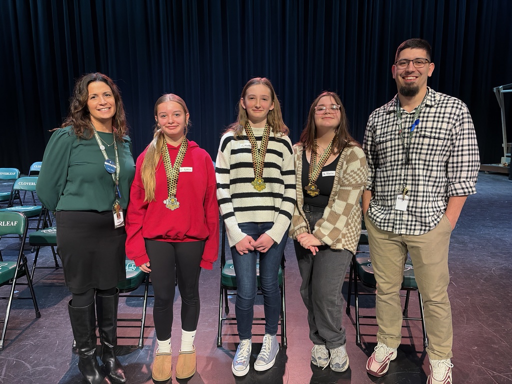 CMS spelling bee winner Maddy Cessna, along with runners-up and principals