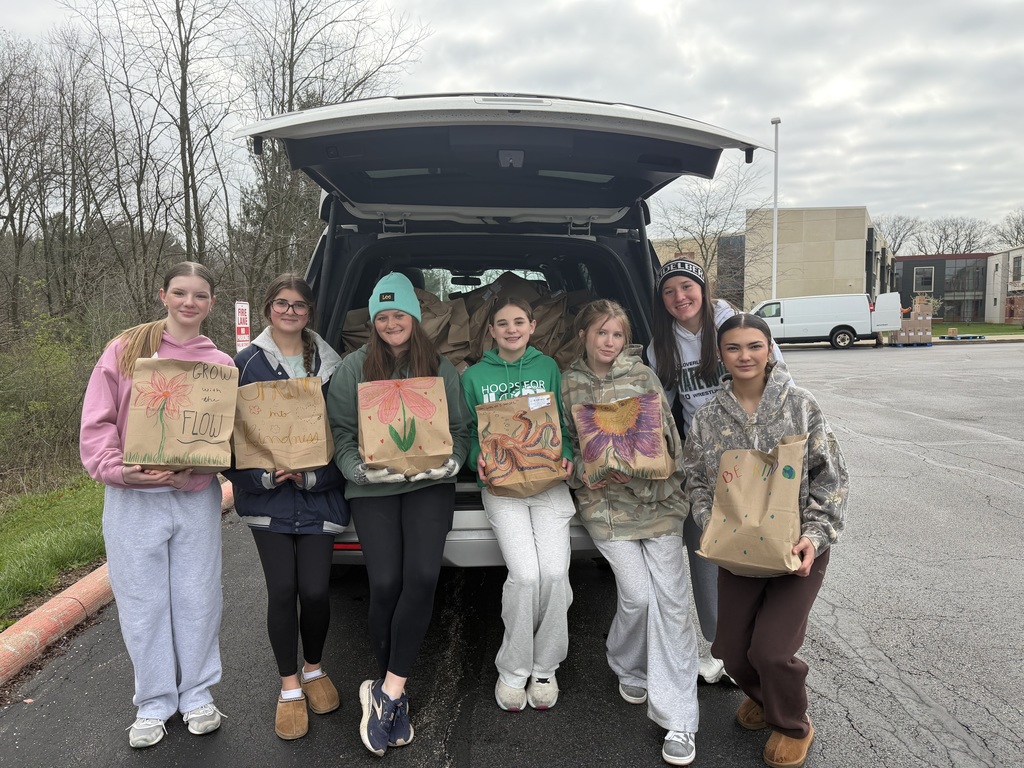Key Club holding Bags of Kindness