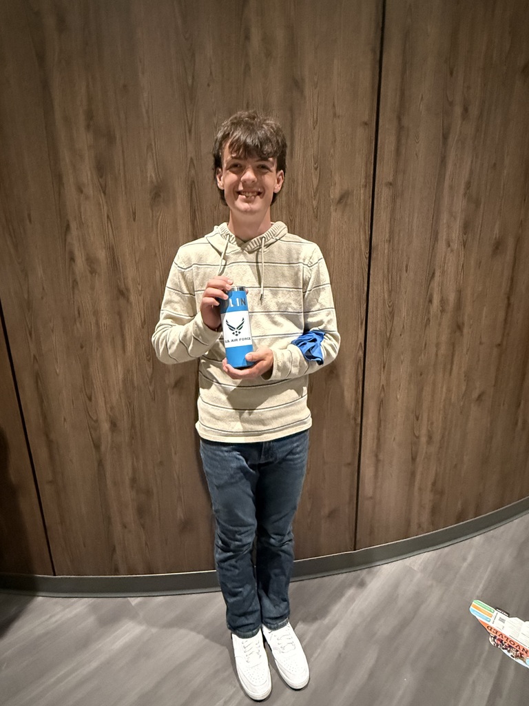 Student with Air Force cup