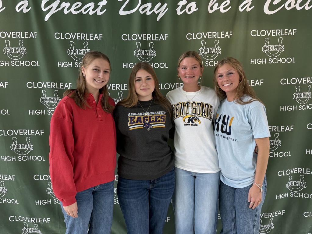 Several students in college shirts