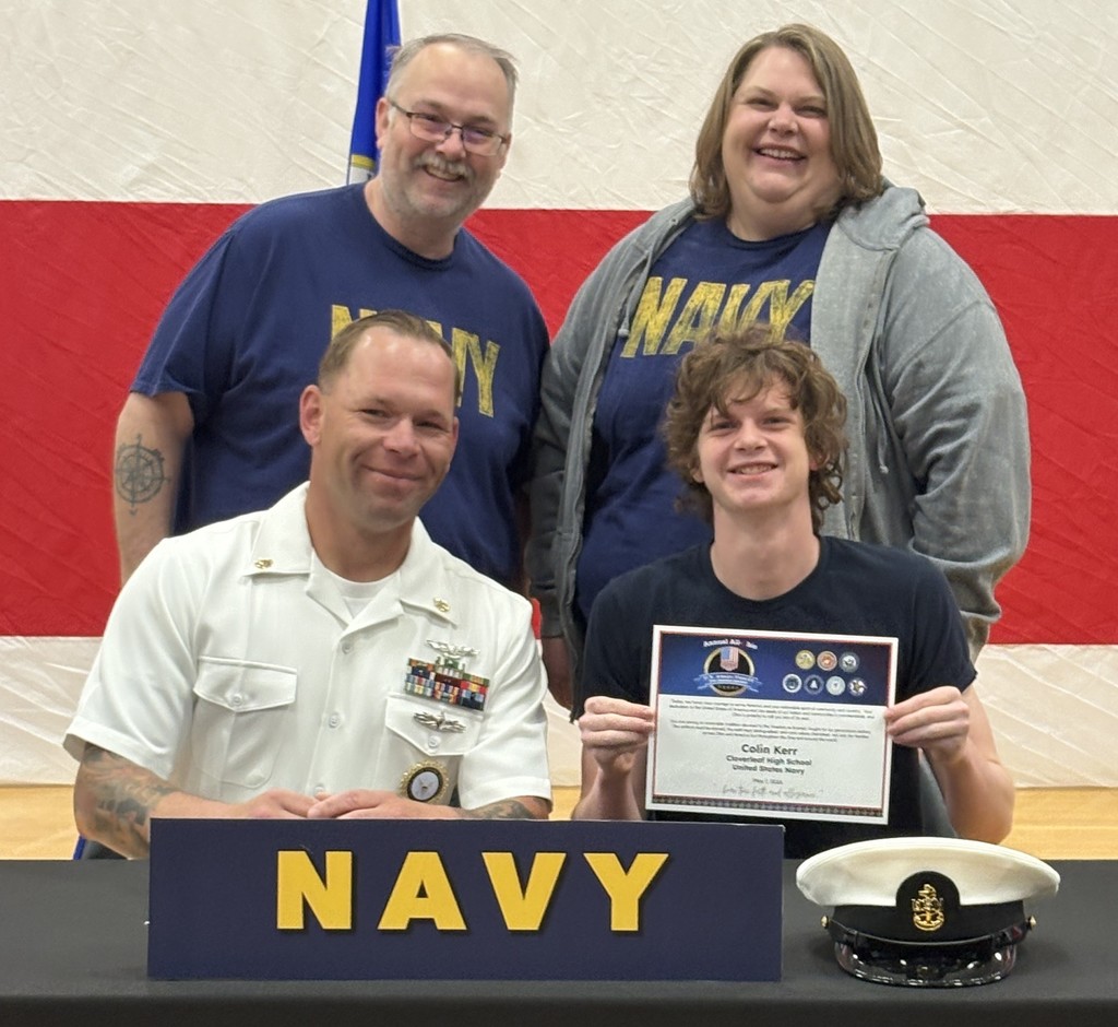 Colin Kerr with family and recruiter