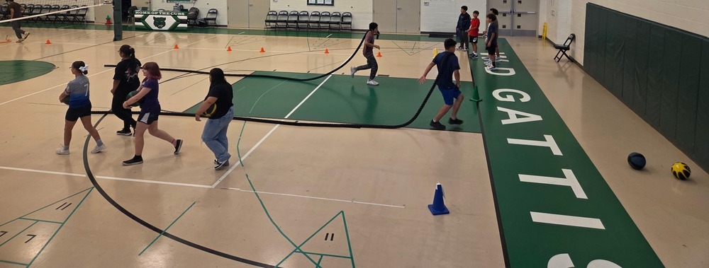 Gattis PE students completing a firefighter challenge