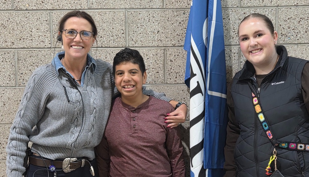 Silas Salguero poses for a picture after winning the perfect attendance award.
