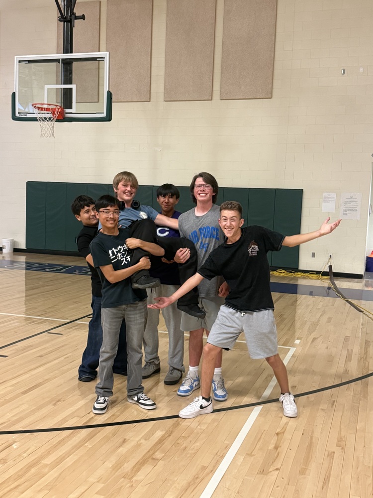 Arlen Shelly is surrounded by supportive friends after winning the Gattis Has Talent, talent show